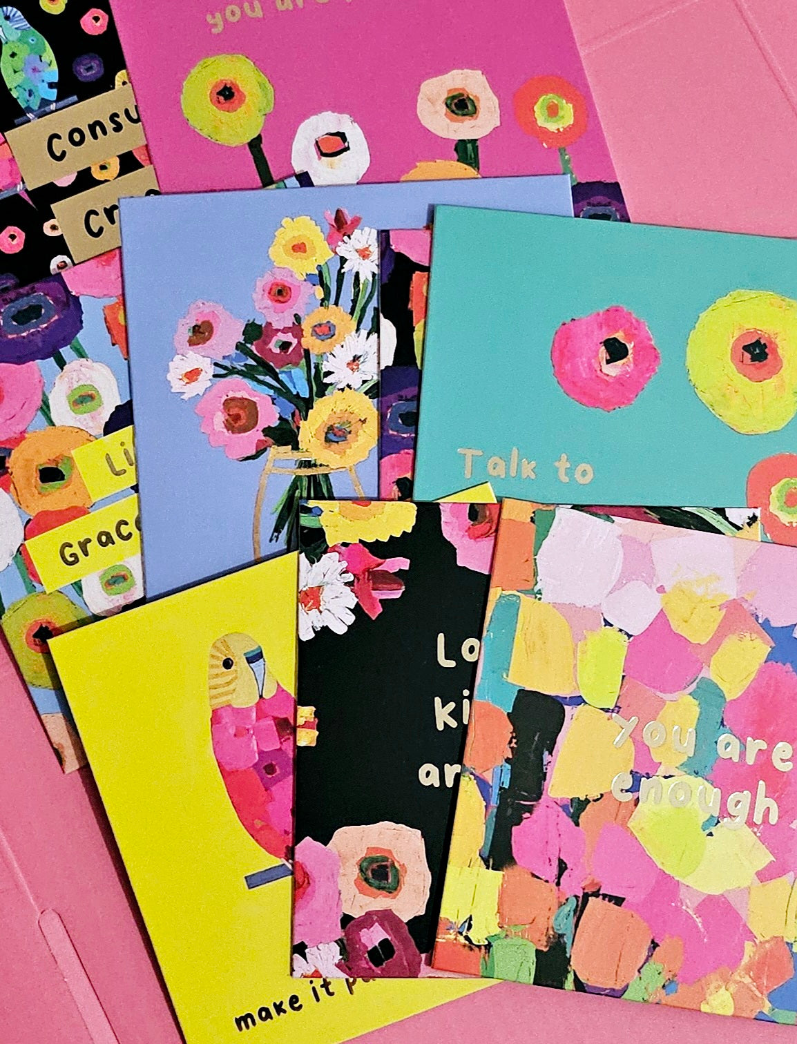 An assortment of affirmation cards, each offering words of encouragement and positivity for young girls on their first period. The cards are designed to inspire confidence and self-love during this important milestone.