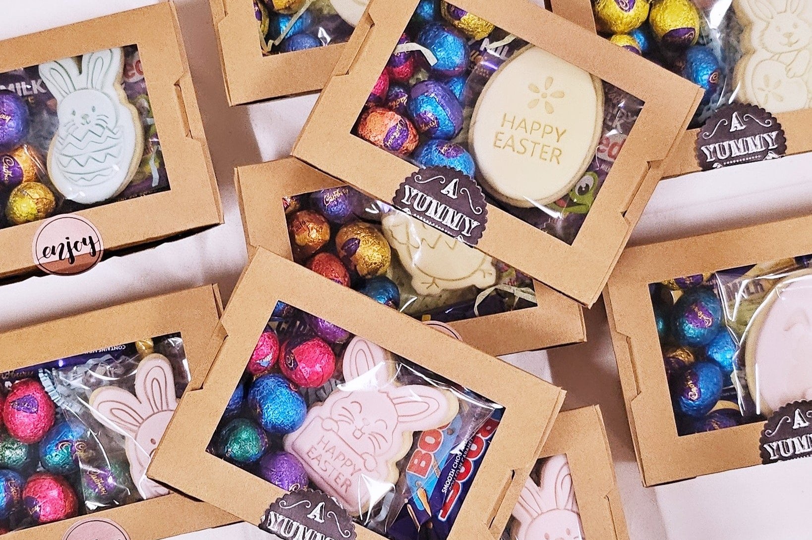 Mini Easter Box: Pre-order now for a festive treat packed with mini Cadbury chocolates, Easter sugar cookies, and Cadbury mini eggs. Perfect for Easter gifting or indulging in sweet holiday fun!