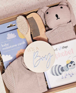 Little Prince Baby Box featuring milestone cards, baby book, brush and comb set, playsuit, wooden photo prop, and rabbit comforter, beautifully topped with confetti and a bow, perfect for newborn baby boy gifts in Perth, WA.