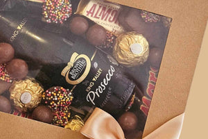 Confetti Box Co. Dessert Box featuring prosecco, Tim Tams, Ferrero Rocher, Maltesers, and Freckles – the perfect luxury gift box for celebrations in Perth